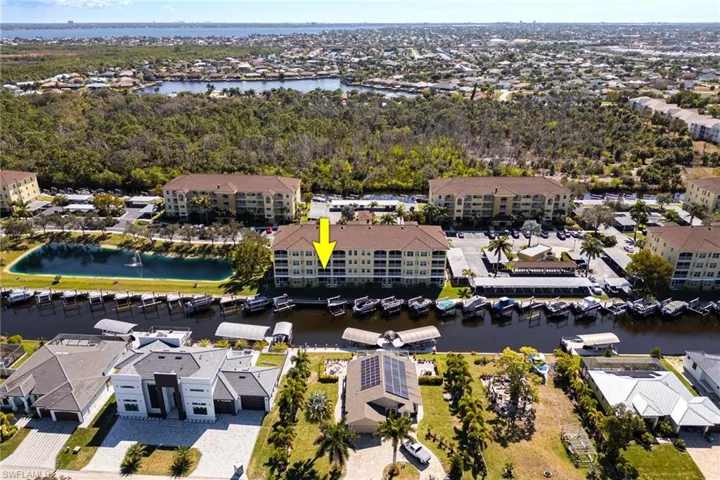 Aerial view of residential area with a large body of water