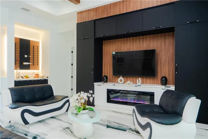 Living room with light tile floors