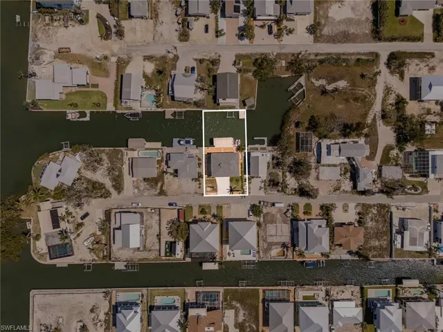 View of property location with nearby suburban area