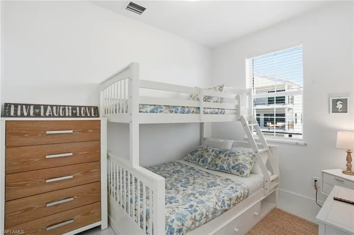 Bedroom featuring light tile patterned flooring