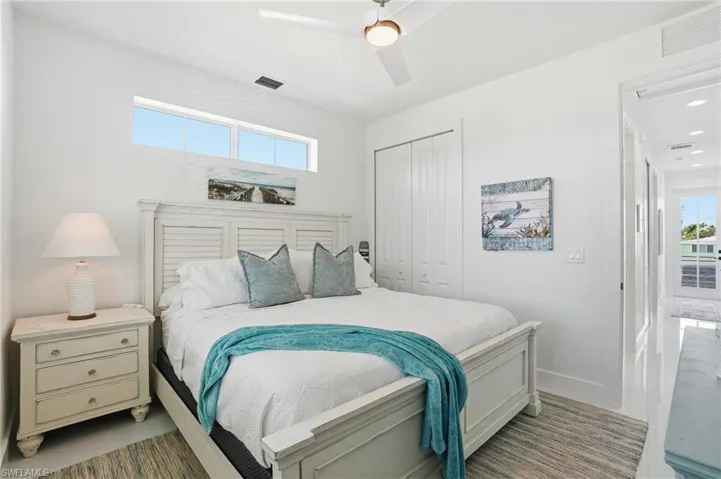 Bedroom featuring a closet and ceiling fan