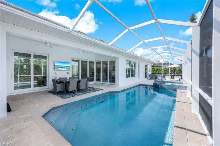 View of swimming pool/Spa and large outdoor living area.