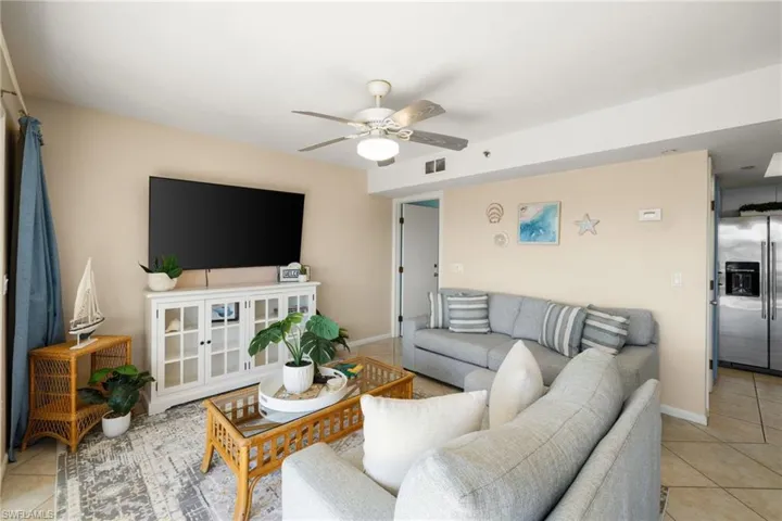 Watch the boats and sunset from your living room.