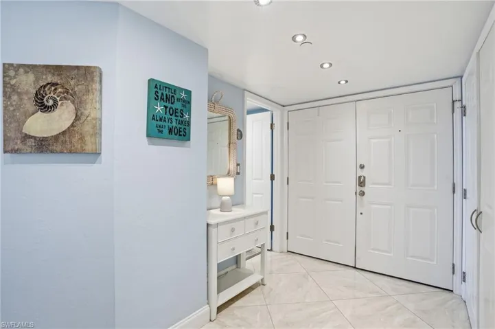 Foyer with recessed lighting and baseboards - Virtually Edited Image