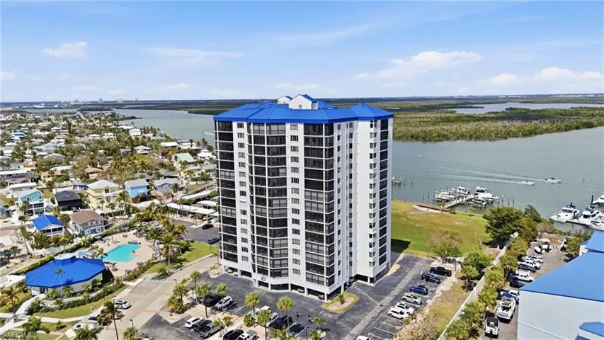 Aerial view of a large body of water and a marina - Virtually Edited Image