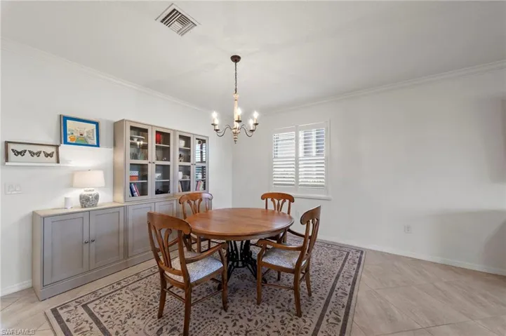 Crown molding, plantation shutters and tile flooring