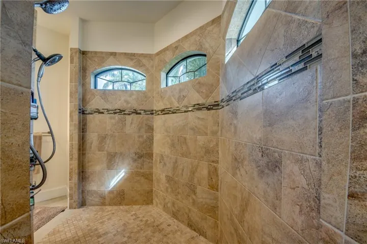 Bathroom featuring walk in shower