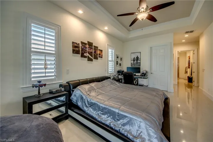 Bedroom featuring crown molding, an office area, recessed lighting, and ceiling fan