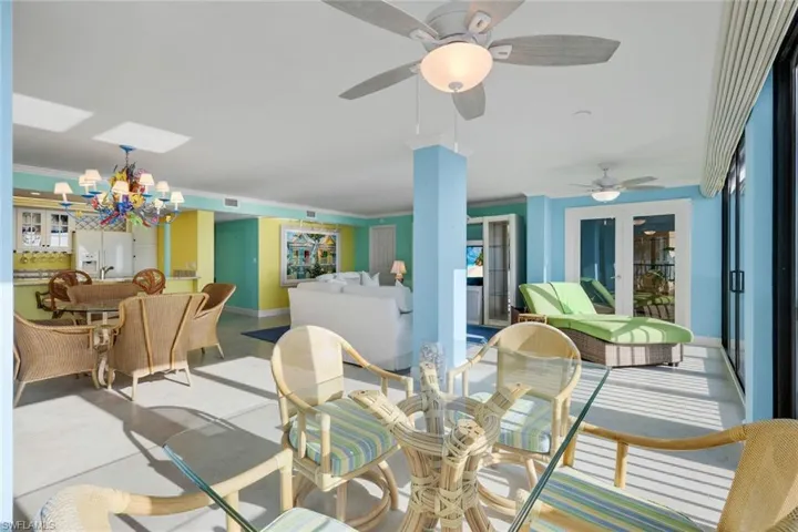 Dining space with a chandelier and ornamental molding