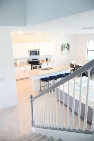 Stairway with tile patterned floors