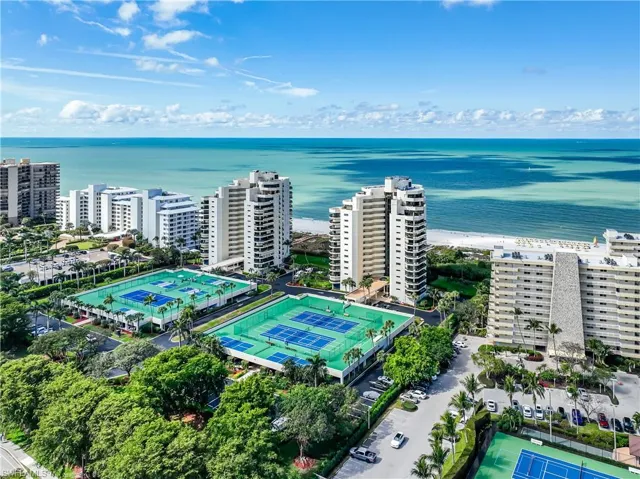 Drone / aerial view with a view of city and a water view