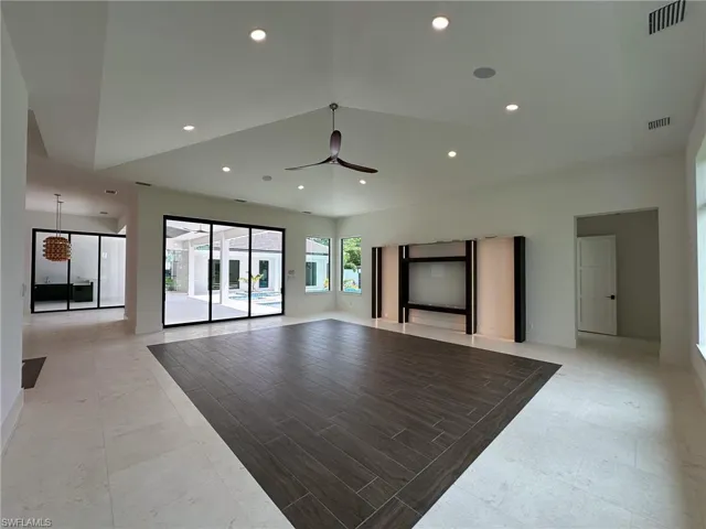 Large Living Room with an illuminated entertainment center