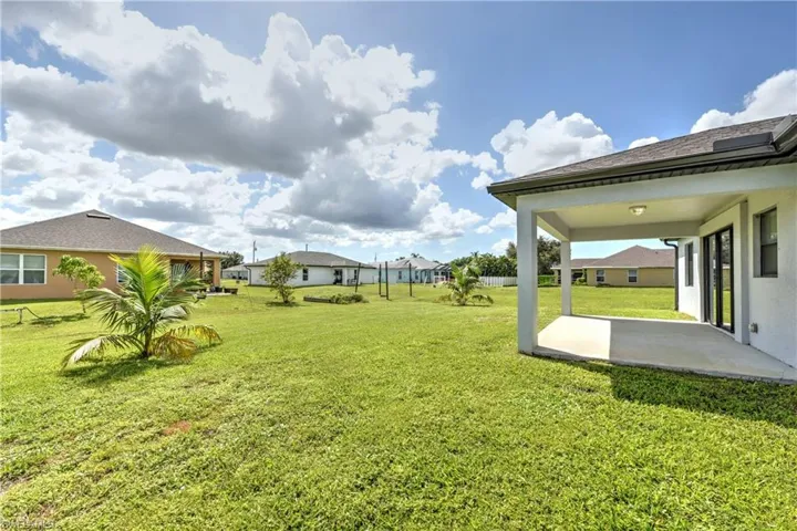 View of yard with a patio area