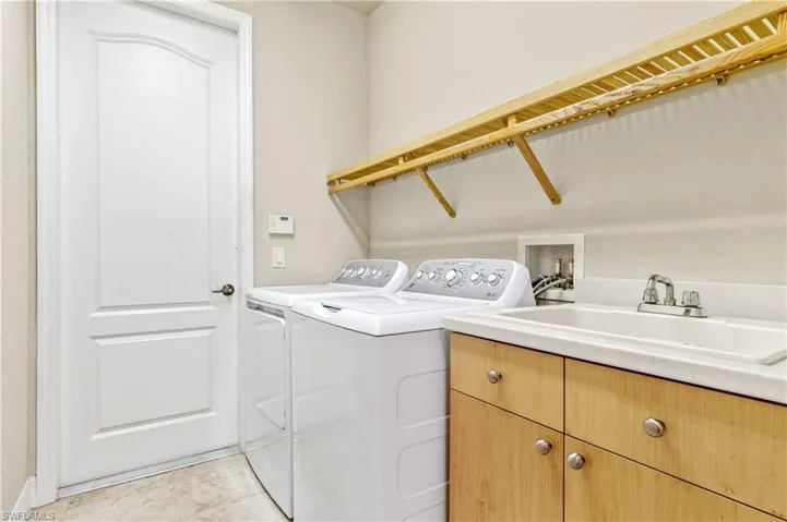 Laundry room with sink