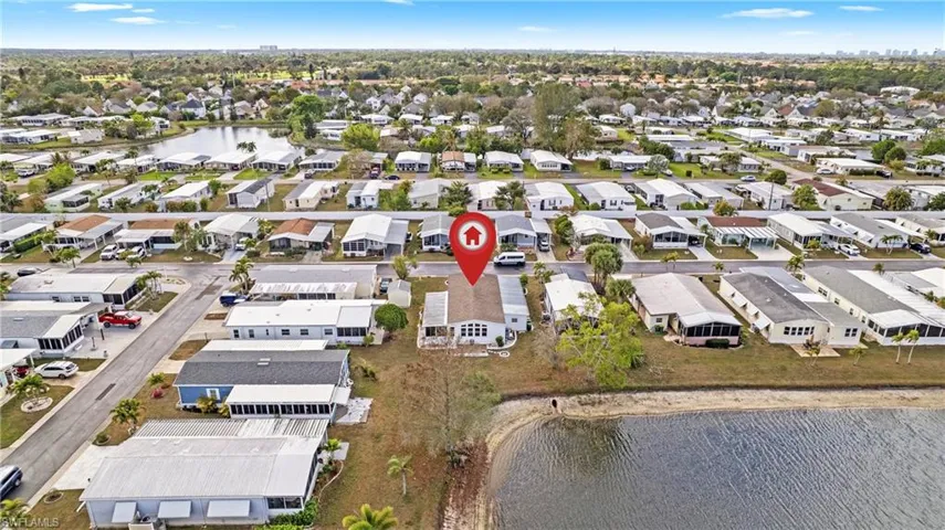 Aerial view of residential area with a nearby body of water