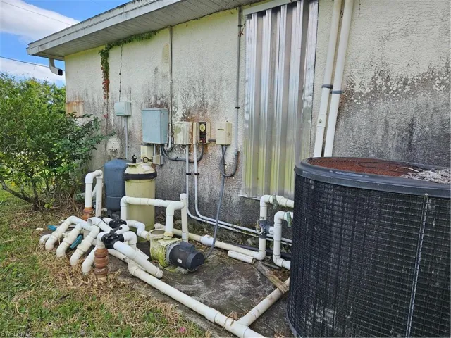 right side of house, pool equipment area