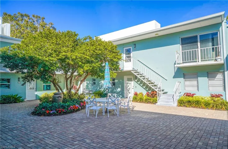 View of patio with outdoor dining space
