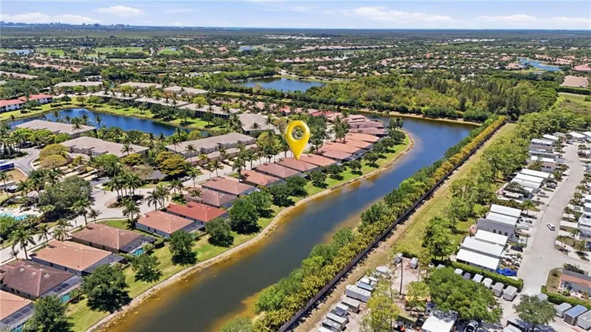 Aerial perspective highlighting a waterfront community with direct canal access