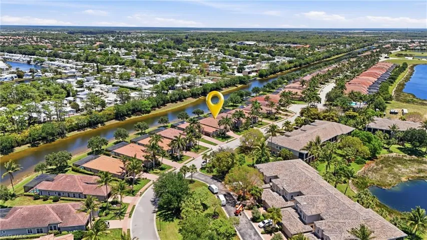 Aerial perspective showcasing a residential community with abundant green spaces