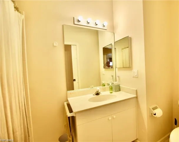 Bathroom with vanity and toilet