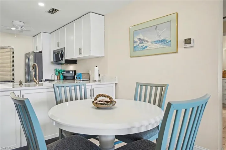 Dining space featuring ceiling fan