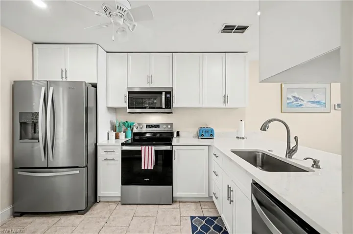 timeless shaker cabinets with brushed nickle hardware