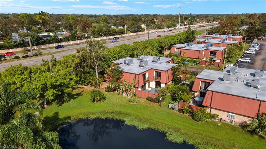 Townhome community featuring brick facades and private balconies