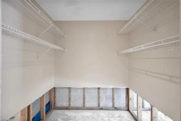 Primary walk-in closet.