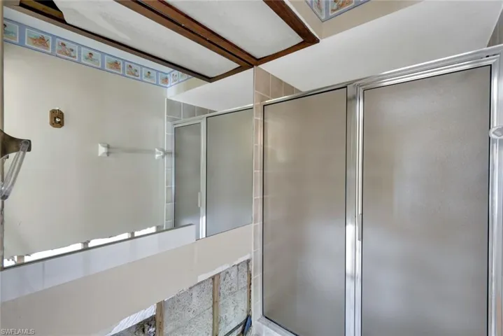 Second bathroom features a walk-in shower.