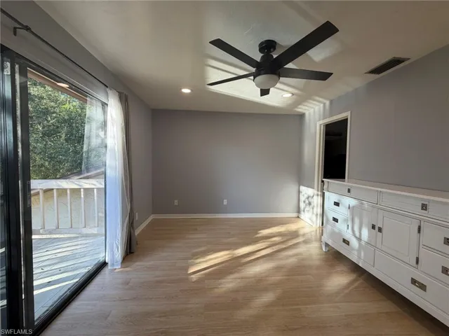 Unfurnished living room with light wood finished floors, ceiling fan, and recessed lighting