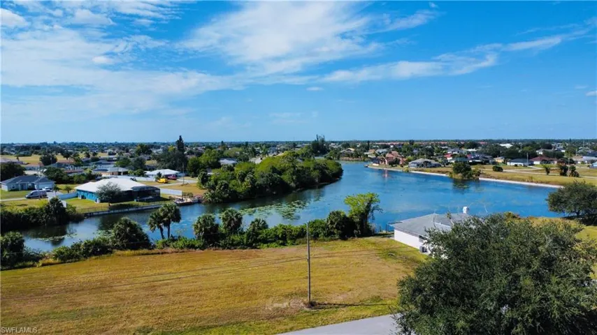Water view featuring nearby suburban area