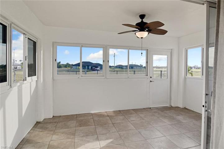 screened in patio w/ window unit.