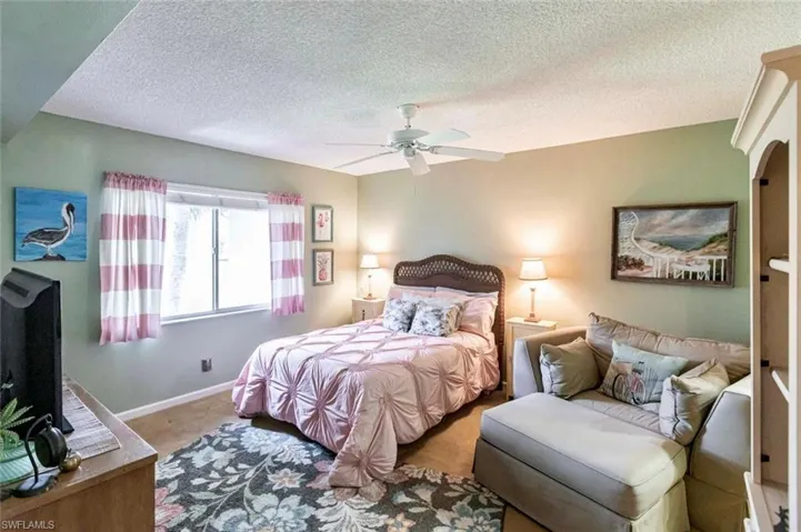 Spacious bedroom with walk-in closet,  and ceiling fan