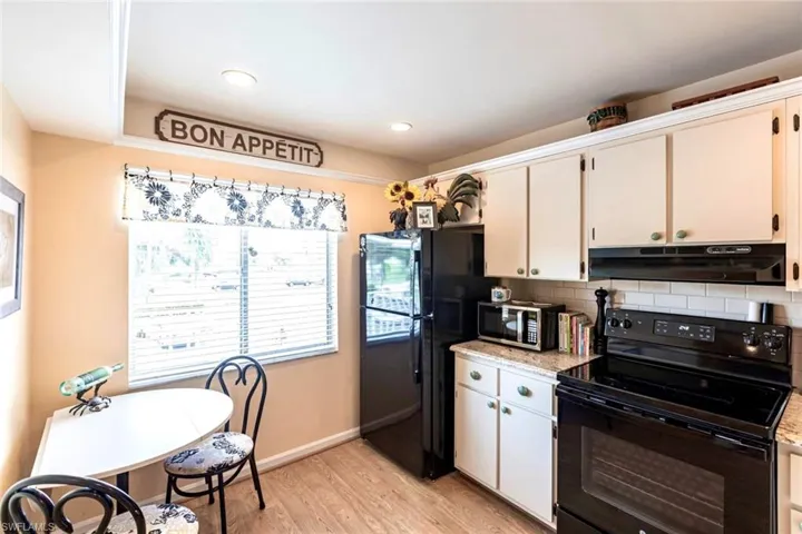 Eat-in kitchen with sunny view window