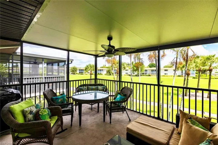 Roomy lanai to relax on with breezes from  the ceiling fan, expansive, lush green views of golf course