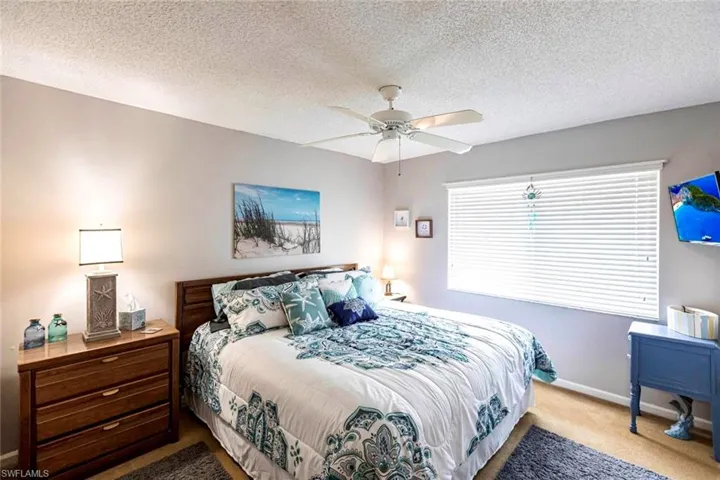 Guest bedroom with  ceiling fan