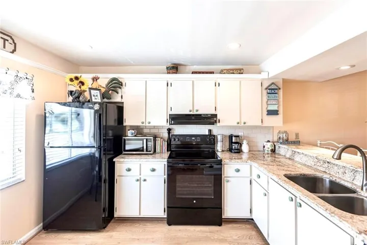 Kitchen featuring recessed lighting