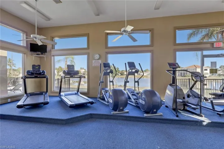 Gym featuring a high ceiling