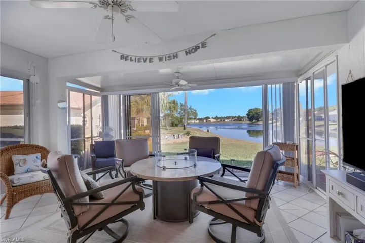 Sunroom featuring tile patterned floors