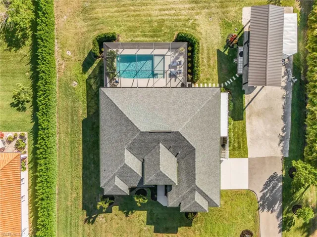 View from above of property featuring a pool
