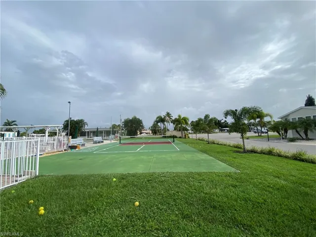 View of property's community featuring pickle ball court