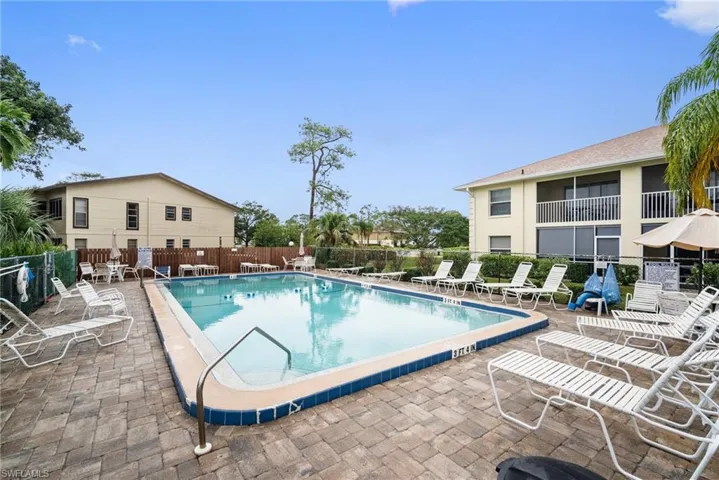 View of pool with sun deck