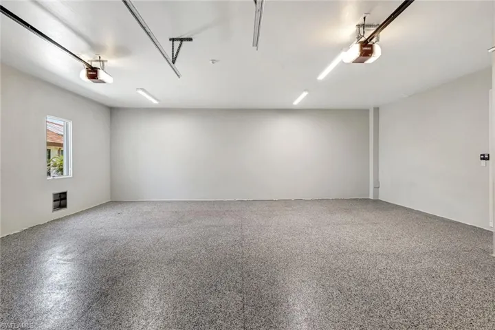 Oversized 2 car garage View of empty room