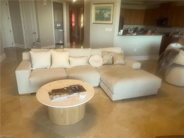 Living room featuring baseboards