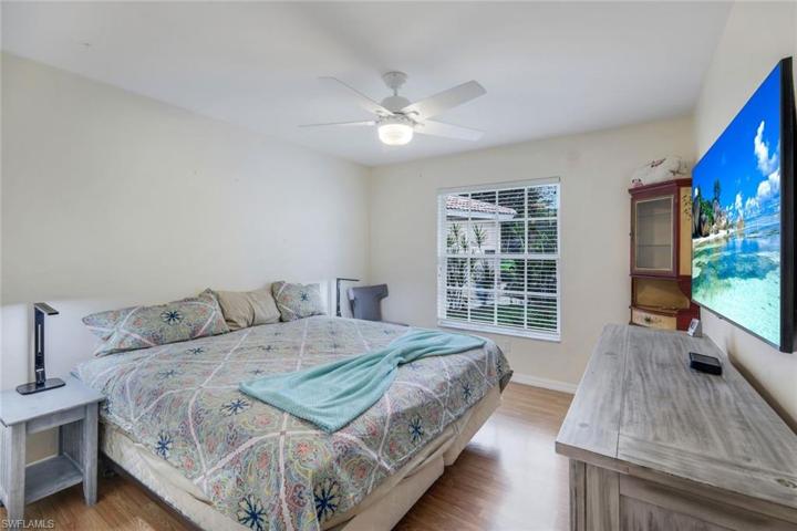 Guest bedroom one, located on opposite side of the home as primary.