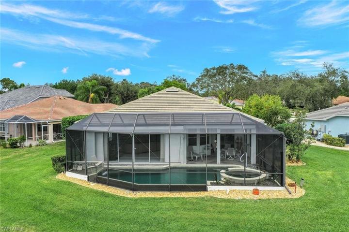 Over 2,000 sq. ft. of gorgeous living space 3 BEDROOM, pool home with a lake view on one of the best lots in Cedar Creek!