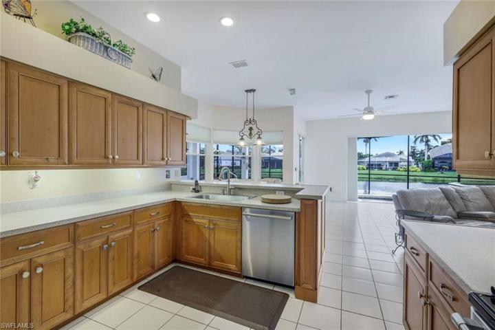 Windows in all the right places! Take in the wide lake view while preparing a favorite meal.