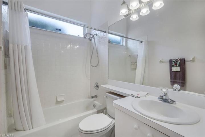 Large guest bathroom with shower/tub combo.