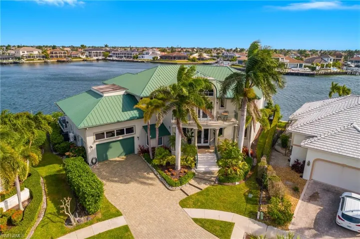 Aerial view of residential area with a large body of water