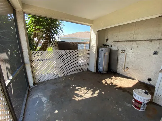 View of patio / terrace featuring water heater